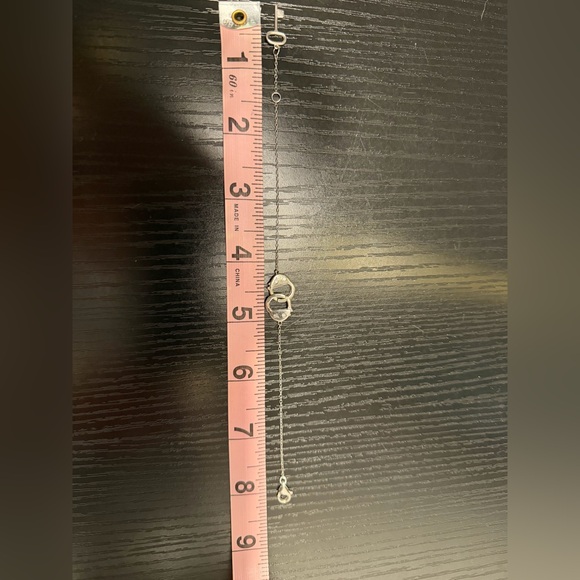 Elegant Silver Key and Handcuffs Bracelet - Picture 4 of 4